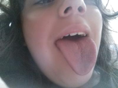 please dont mind tho nose, my tounge is pink because i ate a lollipop but it is usually white